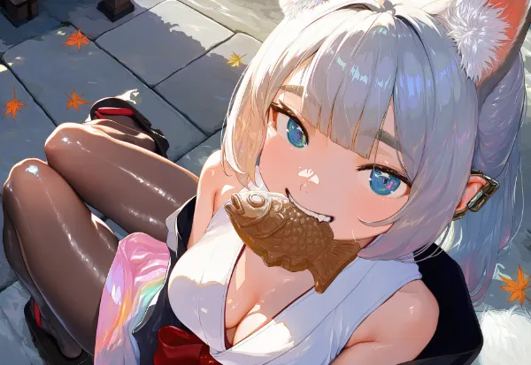 たい焼きくわえた狐