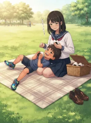 公園でお弁当を食べる姉弟