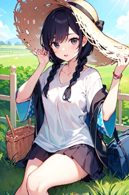 野原で座る少女